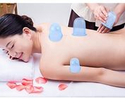 4 PCes que colocam copos colocando da massagem do corpo da terapia para comum e o músculo